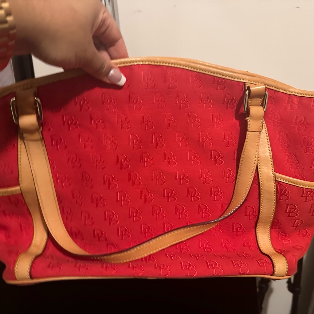 Red Tote with multiple sections.